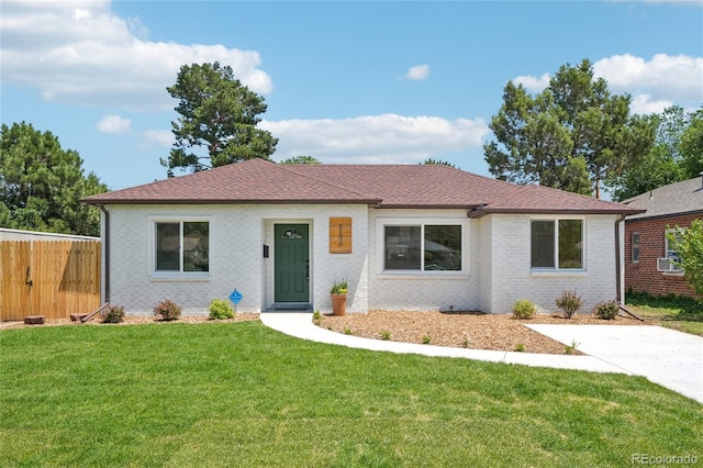 2230 Niagara St, Denver, CO 80207 - view of front of home featuring brick siding and a shingled roof