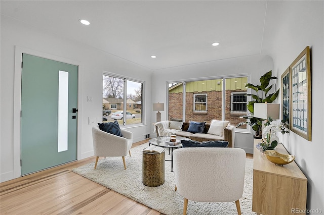 living room featuring recessed lighting and wood finished floors