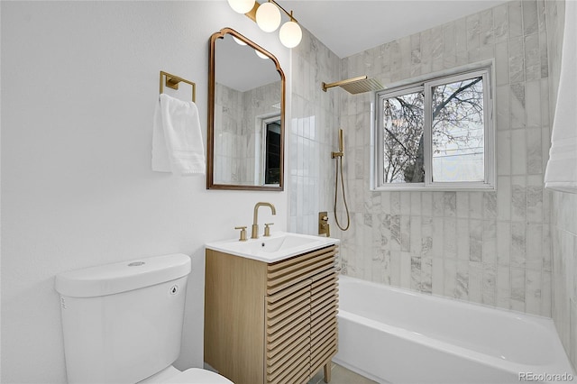 full bath featuring toilet, vanity, and  shower combination