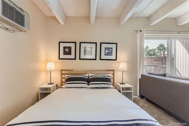 carpeted bedroom with a textured ceiling, beamed ceiling, and a wall unit AC