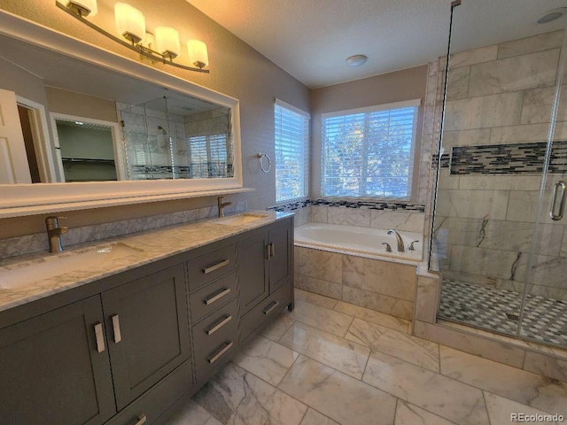 bathroom with vanity and plus walk in shower