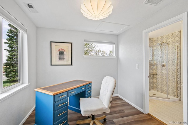 office area with baseboards, dark wood finished floors, attic access, and visible vents
