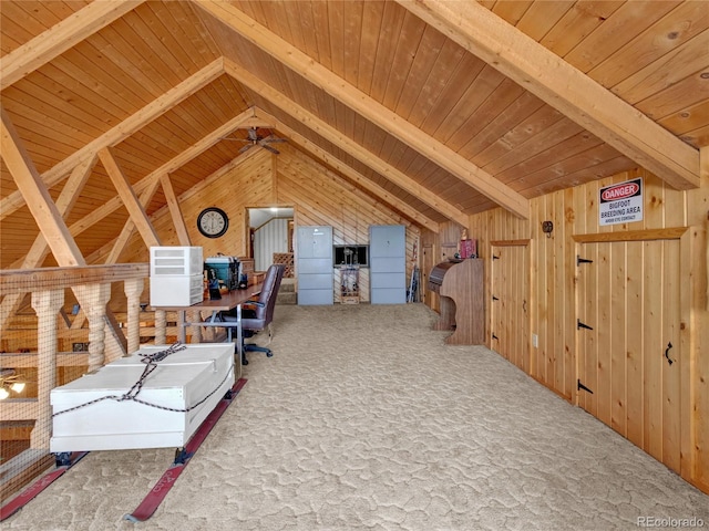 office space with wood walls, carpet flooring, vaulted ceiling with beams, ceiling fan, and wood ceiling