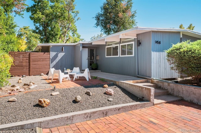 view of front of home featuring a patio area