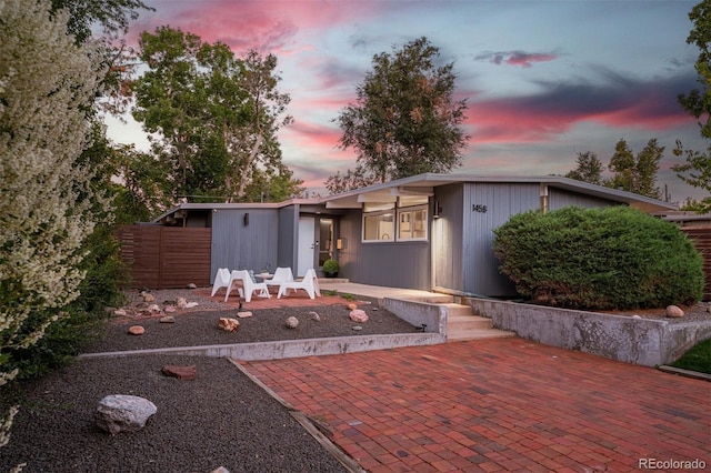 view of front of house with a patio