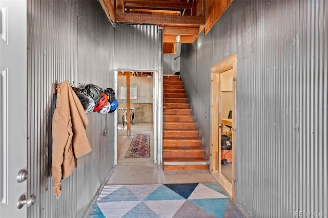 stairs with concrete floors