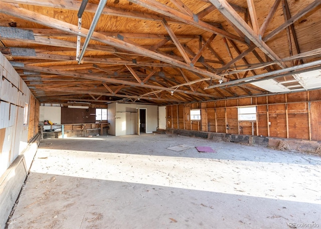 misc room featuring a healthy amount of sunlight and vaulted ceiling