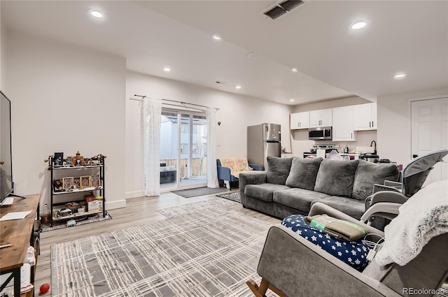 living room featuring light hardwood / wood-style flooring