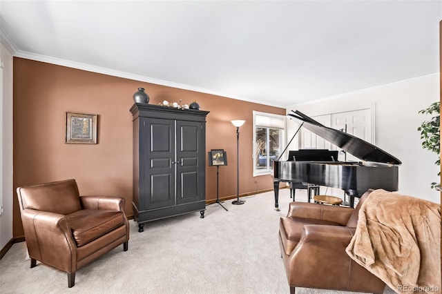 sitting room featuring baseboards, light colored carpet, and ornamental molding