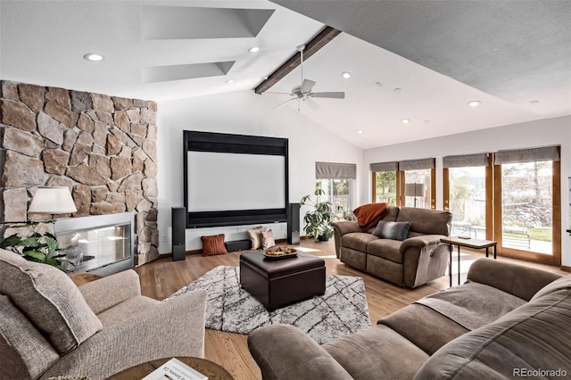 living room with vaulted ceiling with beams, recessed lighting, ceiling fan, and wood finished floors
