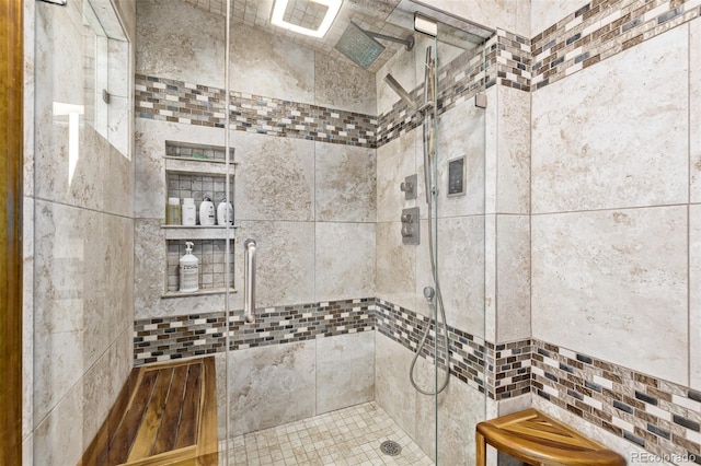 full bathroom featuring a stall shower