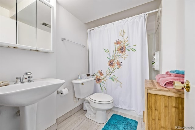 1324 Shadow Mountain Dr, Highlands Ranch, CO 80126 - full bath featuring a sink and tile patterned floors