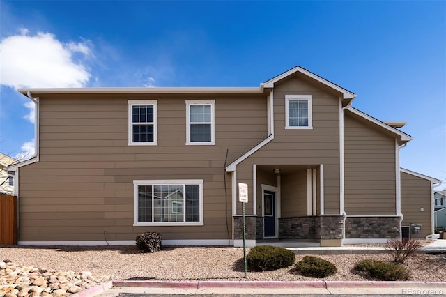 view of front of home with stone siding