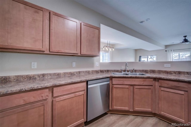 5336 Blair Vw, Colorado Springs, CO 80916 - kitchen featuring light wood-type flooring, plenty of natural light, a sink, and stainless steel dishwasher