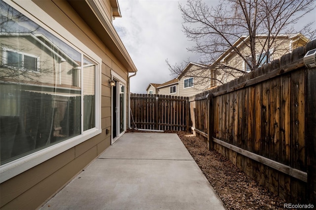 5336 Blair Vw, Colorado Springs, CO 80916 - view of side of home featuring a patio area and a fenced backyard