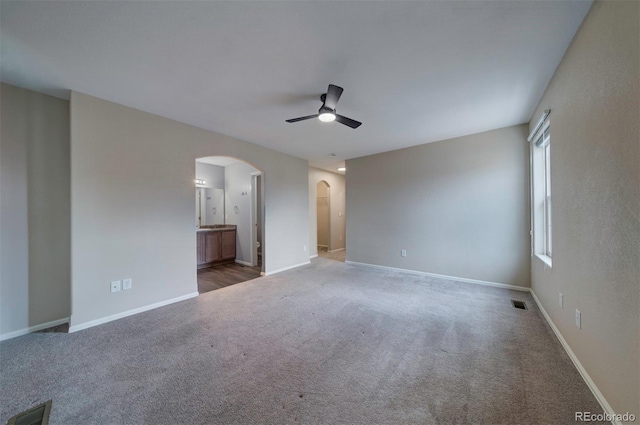 5336 Blair Vw, Colorado Springs, CO 80916 - unfurnished bedroom featuring arched walkways, visible vents, and baseboards