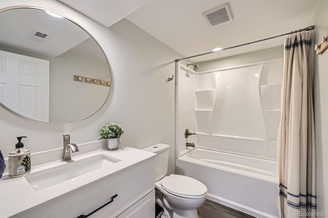 8985 W Quarto Pl, Littleton, CO 80128 - bathroom with shower / bath combination with curtain, vanity, and wood finished floors