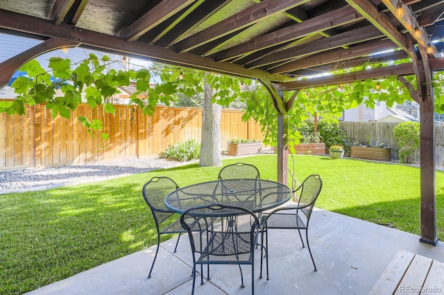 8985 W Quarto Pl, Littleton, CO 80128 - fenced backyard with a patio area and outdoor dining area