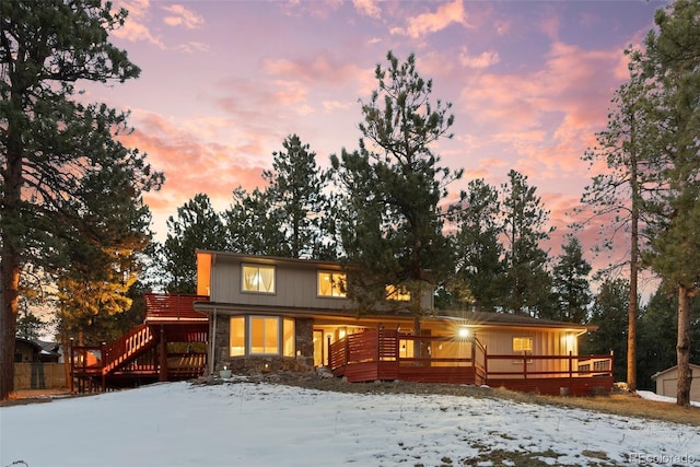 view of front of property featuring an outbuilding and a deck