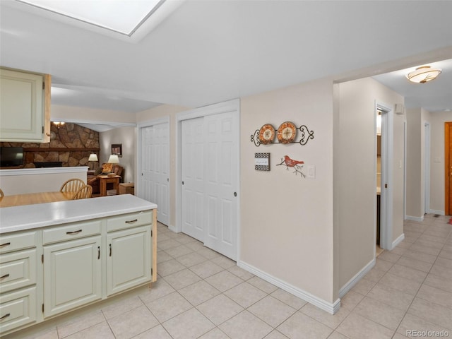 kitchen featuring light tile patterned flooring