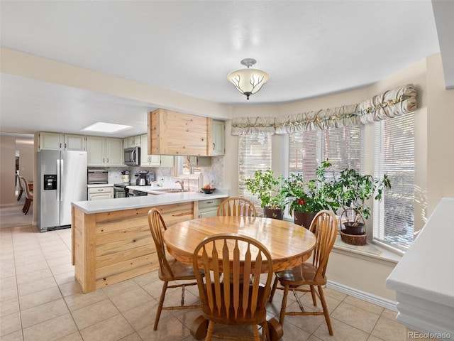 28735 Little Big Horn Dr, Evergreen, CO 80439 - dining area with light tile patterned floors