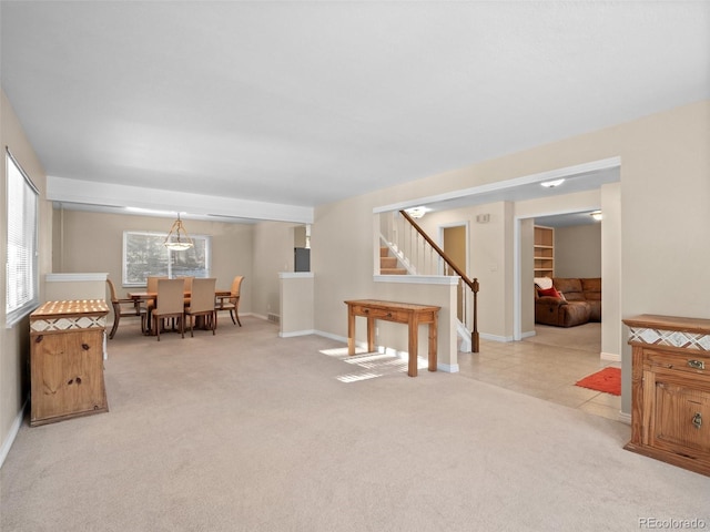 28735 Little Big Horn Dr, Evergreen, CO 80439 - carpeted dining space featuring stairway and baseboards