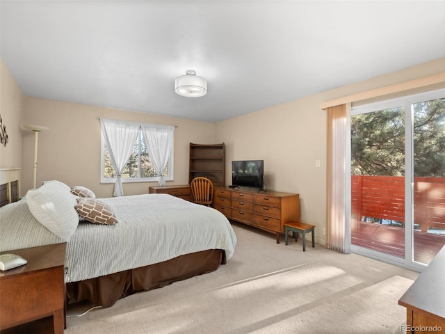 28735 Little Big Horn Dr, Evergreen, CO 80439 - bedroom featuring access to outside and carpet flooring