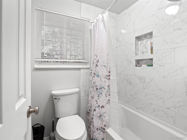 28735 Little Big Horn Dr, Evergreen, CO 80439 - bathroom featuring shower / tub combo with curtain and toilet