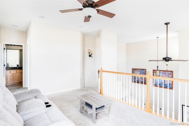 living room featuring ceiling fan and light carpet