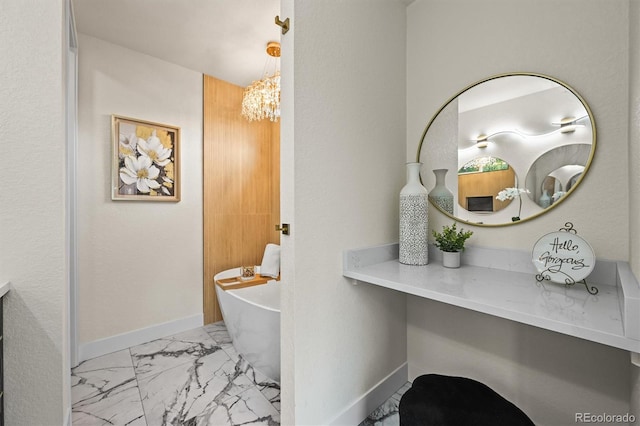 14950 W 32nd Ave, Golden, CO 80401 - corridor with marble finish flooring and a chandelier