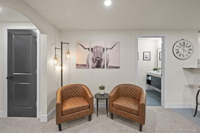 14950 W 32nd Ave, Golden, CO 80401 - living area featuring arched walkways and baseboards