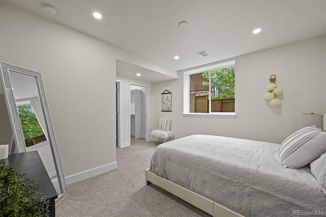 14950 W 32nd Ave, Golden, CO 80401 - bedroom with carpet flooring, recessed lighting, and arched walkways