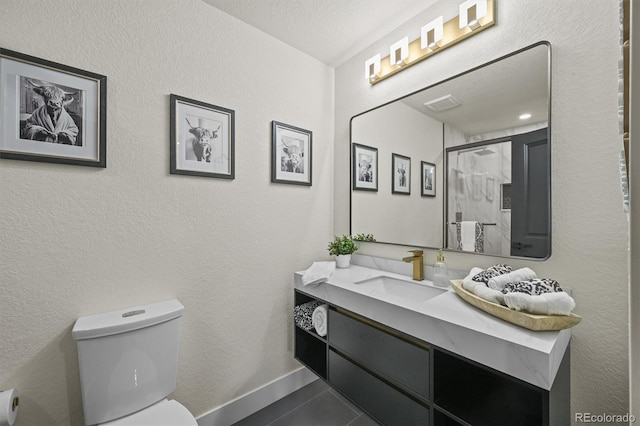 14950 W 32nd Ave, Golden, CO 80401 - full bath with tile patterned flooring, vanity, and a shower