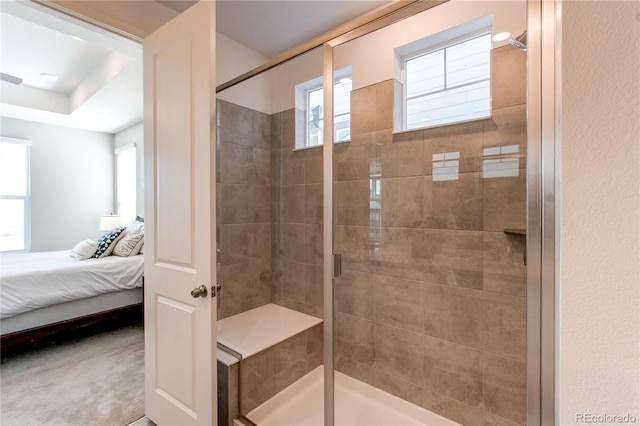 bathroom featuring an enclosed shower