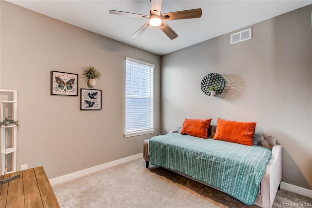 carpeted bedroom with ceiling fan