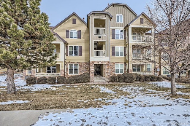 view of snow covered property