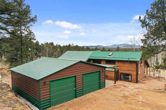 34 Nebraska Cir, Florissant, CO 80816 - detached garage with a mountain view