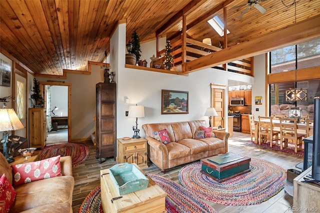 34 Nebraska Cir, Florissant, CO 80816 - living room featuring wood ceiling, vaulted ceiling, and wood finished floors