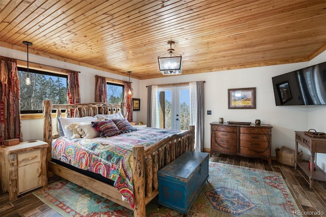 34 Nebraska Cir, Florissant, CO 80816 - bedroom with french doors, wooden ceiling, access to outside, and wood-type flooring