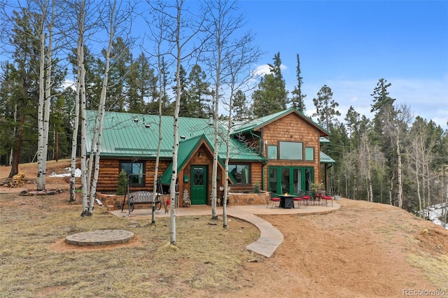 34 Nebraska Cir, Florissant, CO 80816 - back of property with a patio