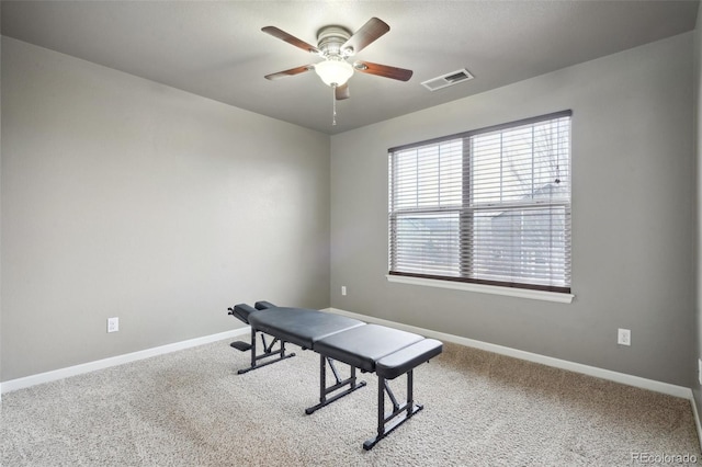 office area with carpet, visible vents, and baseboards