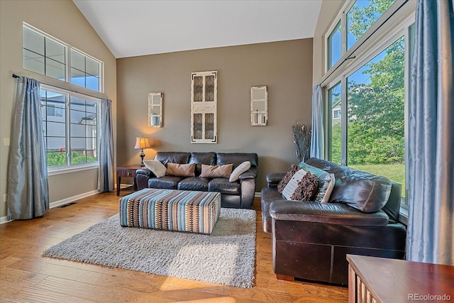 10421 Kennemere Ln, Parker, CO 80134 - living area with hardwood / wood-style floors and high vaulted ceiling