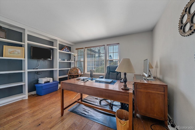 10421 Kennemere Ln, Parker, CO 80134 - office featuring wood finished floors and built in shelves