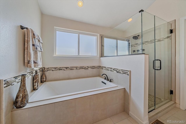 10421 Kennemere Ln, Parker, CO 80134 - full bath featuring a bath, tile patterned flooring, a stall shower, and recessed lighting