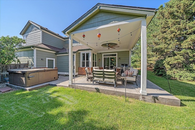 10421 Kennemere Ln, Parker, CO 80134 - rear view of house with a hot tub, a patio area, an outdoor hangout area, and ceiling fan
