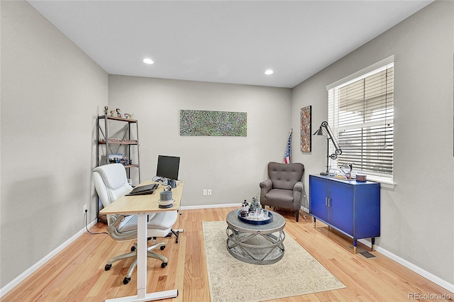 office space with hardwood / wood-style floors