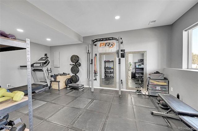 exercise room featuring electric panel