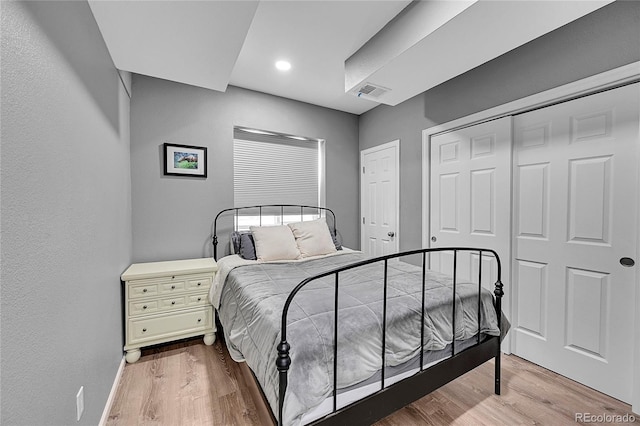 bedroom with light hardwood / wood-style flooring