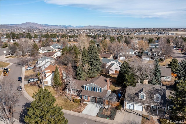 aerial view with a mountain view and a residential view