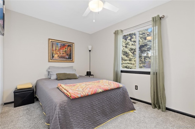 bedroom featuring carpet flooring, a ceiling fan, and baseboards